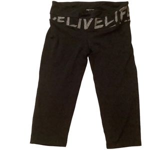 Bebe exercise capris. women sz M. Black and silver